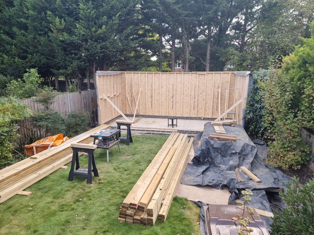Timber frame going up for a garden building